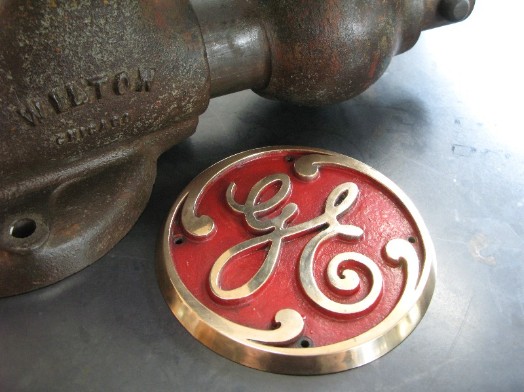 Brass General Electric emblem, flamingsteel.com, Roy Mackey 