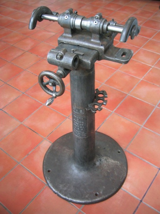 antique belt driven grinder tool, flamingsteel.com, steel sculpture, steel art, roy mackey, early industrial machinery,