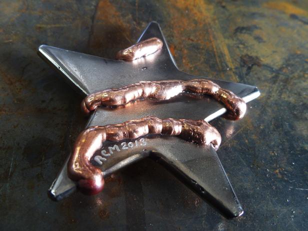copper on steel star, roy mackey, steel sculpture, flamingsteel.com