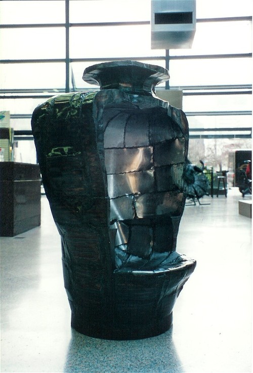 Bottle Chair steel sculpture by Roy Mackey