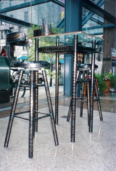 Bar stool and table, Hongkong bank show vancouver bc, steel sculpture, metal sculpture, roy mackey, flamingsteel.com